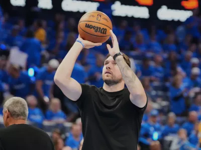 Los Angeles Lakers' Luka Doncic takes a shot during a time out from play in the second half of Game 1 in a second-round NBA basketball playoffs series against the Oklahoma City Thunder Tuesday, May 5, 2026 in Oklahoma City. (AP Photo/Kyle Phillips)