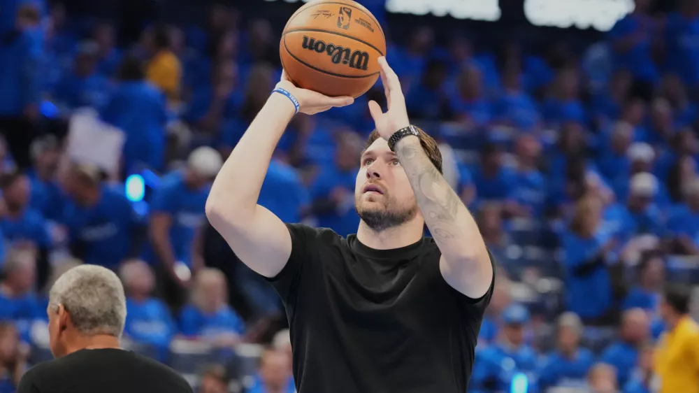 Los Angeles Lakers' Luka Doncic takes a shot during a time out from play in the second half of Game 1 in a second-round NBA basketball playoffs series against the Oklahoma City Thunder Tuesday, May 5, 2026 in Oklahoma City. (AP Photo/Kyle Phillips)