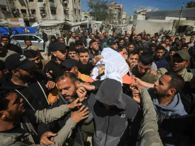 SENSITIVE MATERIAL. THIS IMAGE MAY OFFEND OR DISTURB  Mourners attend the funeral of Azzam Al-Hayya, the son of Khalil Al-Hayya, Hamas' chief negotiator in U.S.-mediated talks over Gaza's future, after Azzam succumbed to his injuries on Thursday after being struck in an Israeli attack on Wednesday, in Gaza City May 7, 2026. REUTERS/Dawoud Abu Alkas
