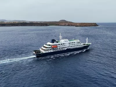 A drone view of the cruise ship MV Hondius, carrying passengers suspected of having cases of hantavirus on board, leaves Praia, Cape Verde, May 6, 2026. REUTERS/Stringer