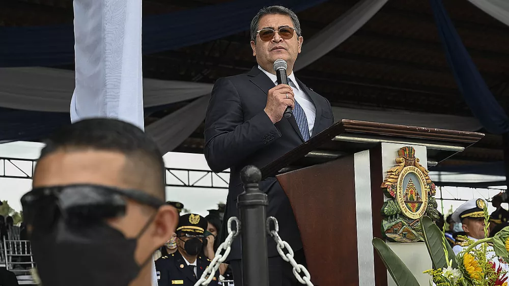 President Juan Orlando Hernandez delivers a speech during the celebration of the 196th anniversary of the Army of Honduras, at the Parada Marte Field, in Tegucigalpa, on December 10, 2021.,Image: 647381676, License: Rights-managed, Restrictions:, Model Release: no