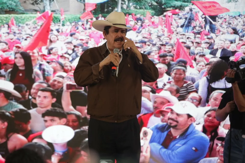 TEGUCIGALPA, HONDURAS - DECEMBER 17: Former Honduran president Manuel Zelaya addresses supporters as dozens of members of the Liberty and Refoundation Party (Libre) enter the Presidential Palace following a call to action by President Xiomara Castro, who says the move aims to denounce what she describes as interference by U.S. President Donald Trump, in Tegucigalpa, Honduras on December 17, 2025. Castro says the interference relates to a pardon granted days before the Honduran elections to former president Juan Orlando Hernandez, who had been sentenced to 45 years in prison on drug trafficking-related charges and was extradited by Castro's government three months after it took office. Protesters also denounce an alleged coup attempt, which Castro says is underway, claim electoral fraud, and call for the annulment of the presidential elections held on November 30. Emilio Flores / Anadolu/ABACAPRESS.COM,Image: 1060037794, License: Rights-managed, Restrictions:, Model Release: no