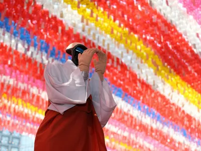 Humanoid robot Gabi folds its hands during a precept ceremony at a temple in Seoul, South Korea, May 6, 2026.  Yonhap via REUTERS  THIS IMAGE HAS BEEN SUPPLIED BY A THIRD PARTY. NO RESALES. NO ARCHIVES. SOUTH KOREA OUT. NO COMMERCIAL OR EDITORIAL SALES IN SOUTH KOREA.