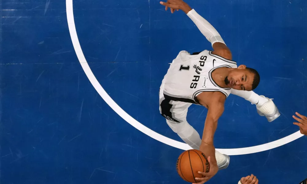 San Antonio Spurs forward Victor Wembanyama (1) grabs a rebound during the second half of Game 3 of a NBA basketball second-round playoff series against the Minnesota Timberwolves, Friday, May 8, 2026, in Minneapolis. (AP Photo/Abbie Parr)
