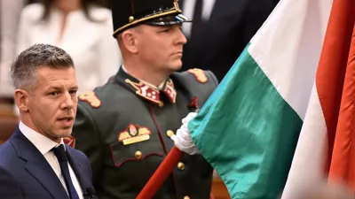 Peter Magyar takes the oath as Hungary's prime minister during a ceremony in Budapest, Hungary, Saturday, May 9, 2026. (AP Photo/Denes Erdos)