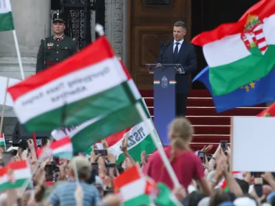 People look on as Hungarian Prime Minister Peter Magyar delivers his speech in front of the Hungarian Parliament, after taking his oath of office, in Budapest, Hungary, May 9, 2026. REUTERS/Leonhard Foeger