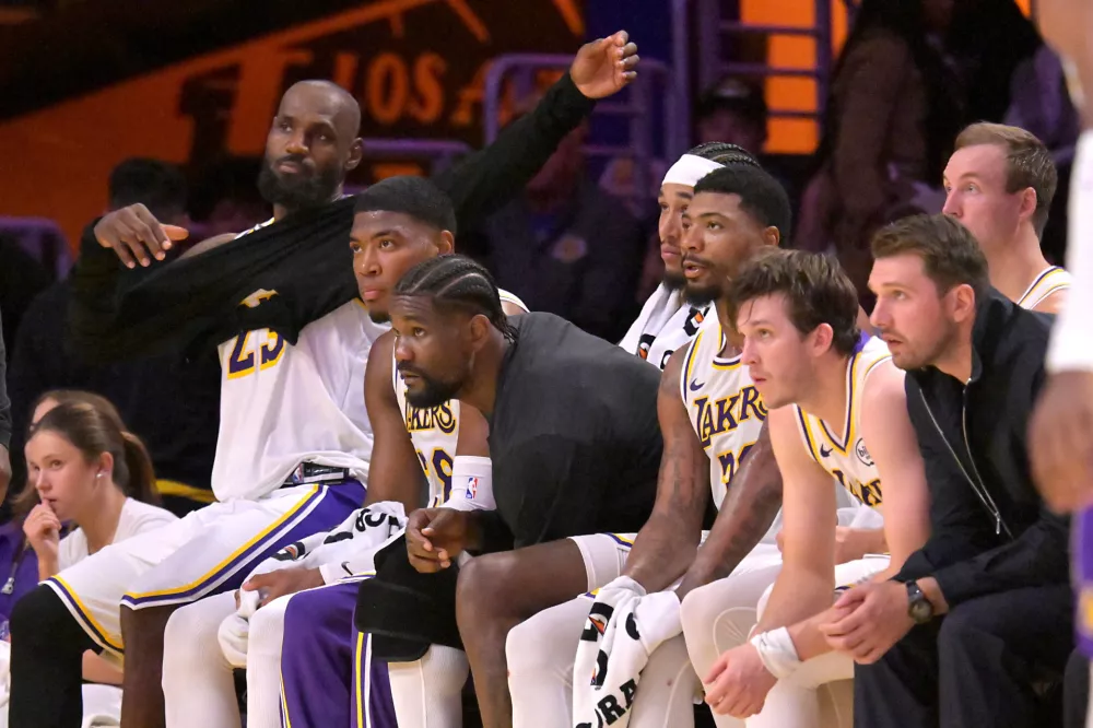 May 9, 2026; Los Angeles, California, USA; Los Angeles Lakers starters look on from the bench in the final minutes of game three of the second round of the 2026 NBA Playoffs against the Oklahoma City Thunder at Crypto.com Arena. Mandatory Credit: Jayne Kamin-Oncea-Imagn Images