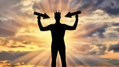 Silhouette of a selfish man with a crown on his head tries to attract attention by holding pointer in his hands. The concept of a selfish and narcissistic personality