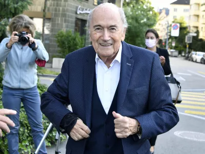 Former FIFA President Sepp Blatter, front, on the way to the Federal Prosecutor's Office in Zurich, Switzerland, Monday, Aug. 9, 2021. Sepp Blatter, faces his final hearing with a Swiss prosecutor on Monday in a fraud probe surrounding a 2011 FIFA payment to Michel Platini. (Walter Bieri/Keystone via AP)