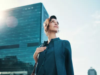 Sunshine, thinking and business woman in city with idea, brainstorming and career insights. Professional, corporate and person with inspiration for company future, urban development and opportunity