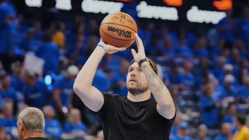 Los Angeles Lakers' Luka Doncic takes a shot during a time out from play in the second half of Game 1 in a second-round NBA basketball playoffs series against the Oklahoma City Thunder Tuesday, May 5, 2026 in Oklahoma City. (AP Photo/Kyle Phillips)