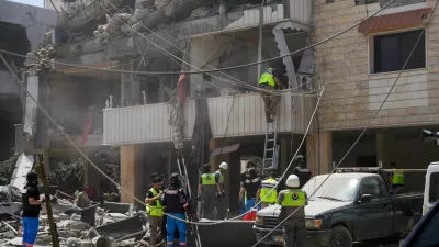 Rescuers work at the site of an Israeli strike in Kfar Jouz, Lebanon, May 11, 2026. REUTERS/Stringer