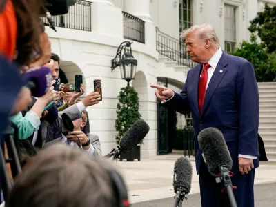 FILE PHOTO: U.S. President Donald Trump gestures as he talks to reporters at the White House in Washington, D.C., U.S., May 8, 2026. REUTERS/Elizabeth Frantz/File Photo