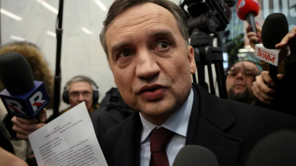 FILE PHOTO: Member of the Law and Justice (PiS) party and former Poland's Justice Minister Zbigniew Ziobro reacts after he was detained by police at the Polish TV Republika station's headquarters to be brought to testify before the Pegasus Investigation Committee, in Warsaw, Poland January 31, 2025. Agencja Wyborcza.pl/Robert Kowalewski/via REUTERS  ATTENTION EDITORS - THIS IMAGE WAS PROVIDED BY A THIRD PARTY. POLAND OUT. NO COMMERCIAL OR EDITORIAL SALES IN POLAND./File Photo