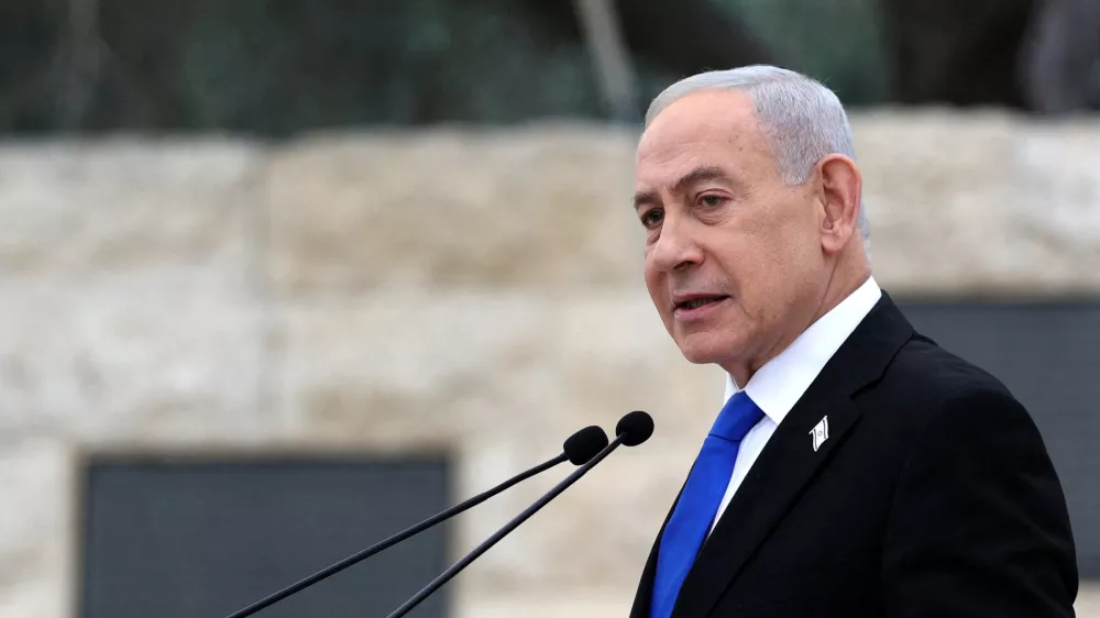 FILE PHOTO: Israel's Prime Minister Benjamin Netanyahu speaks during a ceremony commemorating Israel's Remembrance Day for fallen soldiers, or Yom HaZikaron, at the Military Cemetery on Mount Herzl in Jerusalem April 21, 2026.   ILIA YEFIMOVICH/Pool via REUTERS/File Photo