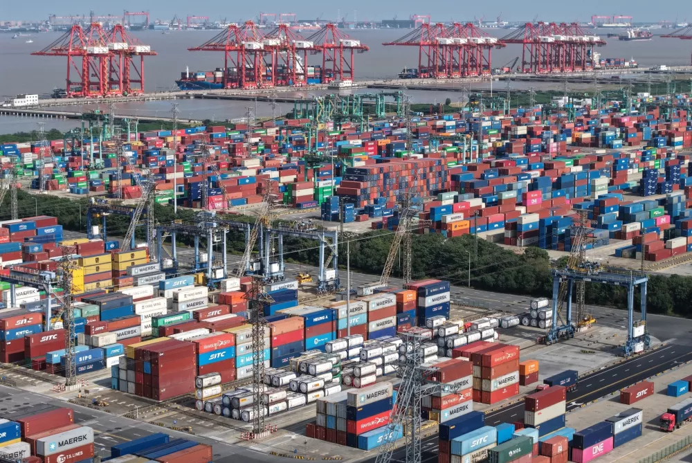 An aerial view of a container terminal in seen in Shanghai, Tuesday, March 10, 2026. (Chinatopix via AP)