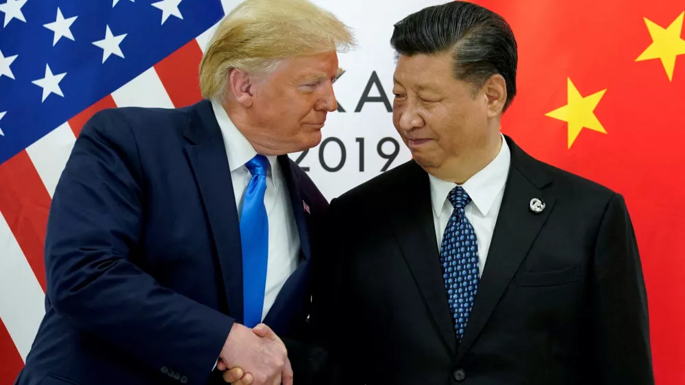 FILE PHOTO: FILE PHOTO: U.S. President Donald Trump meets with China's President Xi Jinping at the start of their bilateral meeting at the G20 leaders summit in Osaka, Japan, June 29, 2019. REUTERS/Kevin Lamarque/File Photo/File Photo