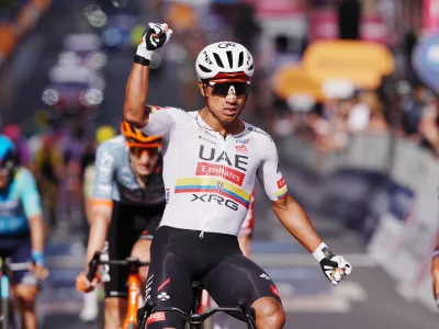 Ecuador's Manuel Jhonatan Narvaez celebrates winning the 4th stage of the Giro d'Italia cycling race, from Catanzaro to Cosenza, Italy, Tuesday, May 12, 2026. (Gian Mattia d'Alberto/LaPresse via AP)