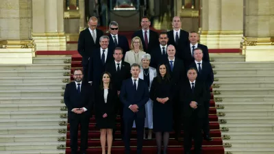 Hungarian Prime Minister Peter Magyar and new members of government, Finance Minister Andras Karman, Minister of Regional and Rural Development Viktoria Lorinc, Foreign Minister Anita Orban, Minister for the Living Environment Laszlo Gajdos, PM's Chief of Staff Balint Ruff, Children and Education Minister Judit Lannert, Science and Technology Minister Zoltan Tanacs, Interior Minister Posfai Gabor, Economy and Energy Affairs Minister Istvan Kapitany, Justice Minister Marta Gorog, Agriculture and Food Minister Szabolcs Bona, Defence Minister Romulusz Ruszin-Szendi, Social Relations and Culture Minister Zoltan Tarr, Social and Family Affairs Minister Vilmos Katai-Nemeth, Minister of Transport and Investment David Vitezy and Health Minister Zsolt Hegedus, pose for a family photo in the Parliament, in Budapest, Hungary, May 12, 2026. REUTERS/Bernadett Szabo   TPX IMAGES OF THE DAY
