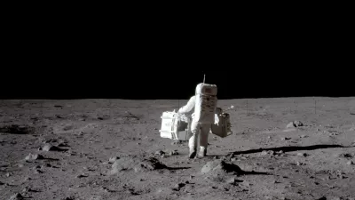 FILE PHOTO: Apollo 11 lunar module pilot Buzz Aldrin carries equipment for the Passive Seismic Experiments (in his left hand) and the Laser Ranging Retroreflector (in his right) to the deployment area at Tranquility Base in the Sea of Tranquility on the moon, July 20, 1969. Neil Armstrong/NASA/Handout via REUTERS/File Photo  ATTENTION EDITORS - THIS IMAGE HAS BEEN SUPPLIED BY A THIRD PARTY.  PLEASE SEARCH "50TH ANNIVERSARY OF THE MOON LANDING" FOR ALL PICTURES