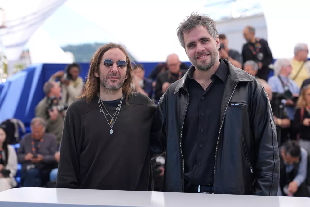 Director Juan Cabral, left, and director Santiago Franco pose for photographers at the photo call for the film 'The Match' during the 79th international film festival, Cannes, southern France, Thursday, May 14, 2026. (AP Photo/Andreea Alexandru)