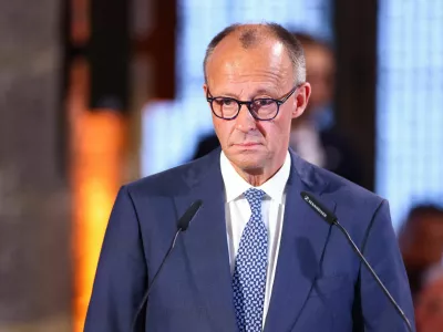 German Chancellor Friedrich Merz speaks during a ceremony to award European Central Bank (ECB) former President and Italian former Prime Minister Mario Draghi the International Charlemagne Prize (Karlspreis) 2026, in Aachen, Germany, May 14, 2026. REUTERS/Thilo Schmuelgen