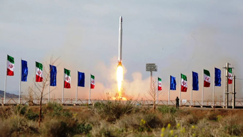 In this photo released Wednesday, April 22, 2020, by Sepahnews, an Iranian rocket carrying a satellite is launched from an undisclosed site believed to be in Iran's Semnan province. Iran's Revolutionary Guard said Wednesday it put the Islamic Republic's first military satellite into orbit, dramatically unveiling what experts described as a secret space program with a surprise launch that came amid wider tensions with the United States. (Sepahnews via AP)