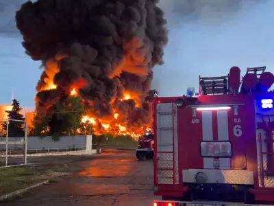 In this handout photo made from video released by the Governor of Sevastopol Mikhail Razvozhaev telegram channel on Saturday, April 29, 2023, smoke and flame rise from a burning fuel tank in Sevastopol, Crimea. A massive fire erupted at an oil reservoir there after it was hit by a drone, a Russian-appointed official there reported on Saturday. (Sevastopol Governor Mikhail Razvozhaev telegram channel via AP)
