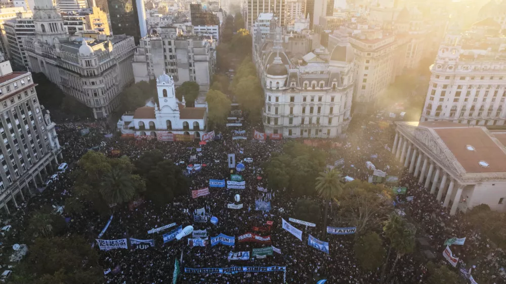 People protest to demand more fundings for public universities in Buenos Aires, Argentina, Tuesday, May 12, 2026. (AP Photo/Rodrigo Abd)