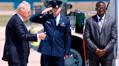 President Donald Trump gives a thumbs up as he walks from Marine One to Air Force One, upon his arrival at Joint Base Andrews, Md., Tuesday, May 12, 2026, for a trip to China to meet President Xi Jinping. (AP Photo/Luis M. Alvarez)