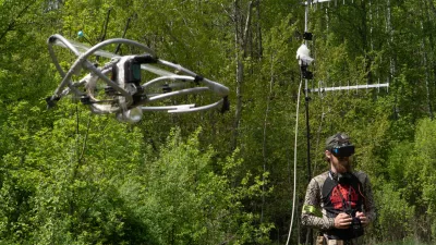 A recruit of Ukraine's 58th Mechanized Brigade practices military skills with an FPV drone at a training ground near the frontline in the Kharkiv region, Ukraine, Tuesday, May 12, 2026. (AP Photo/Andrii Marienko)