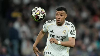 Real Madrid's Kylian Mbappe watches the ball during the Champions League quarterfinal first leg soccer match between Real Madrid and Bayern Munich in Madrid, Spain, Tuesday, April 7, 2026. (AP Photo/Bernat Armangue)