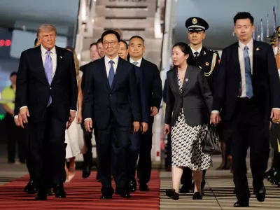U.S. President Donald Trump participates in an arrival ceremony at Beijing Capital International Airport during his visit to the country, in Beijing, China, May 13, 2026. REUTERS/Evan Vucci