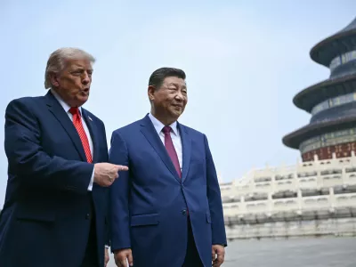 China's President Xi Jinping, right, and U.S. President Donald Trump visit the Temple of Heaven in Beijing Thursday, May 14, 2026. (Brendan Smialowski/Pool Photo via AP)