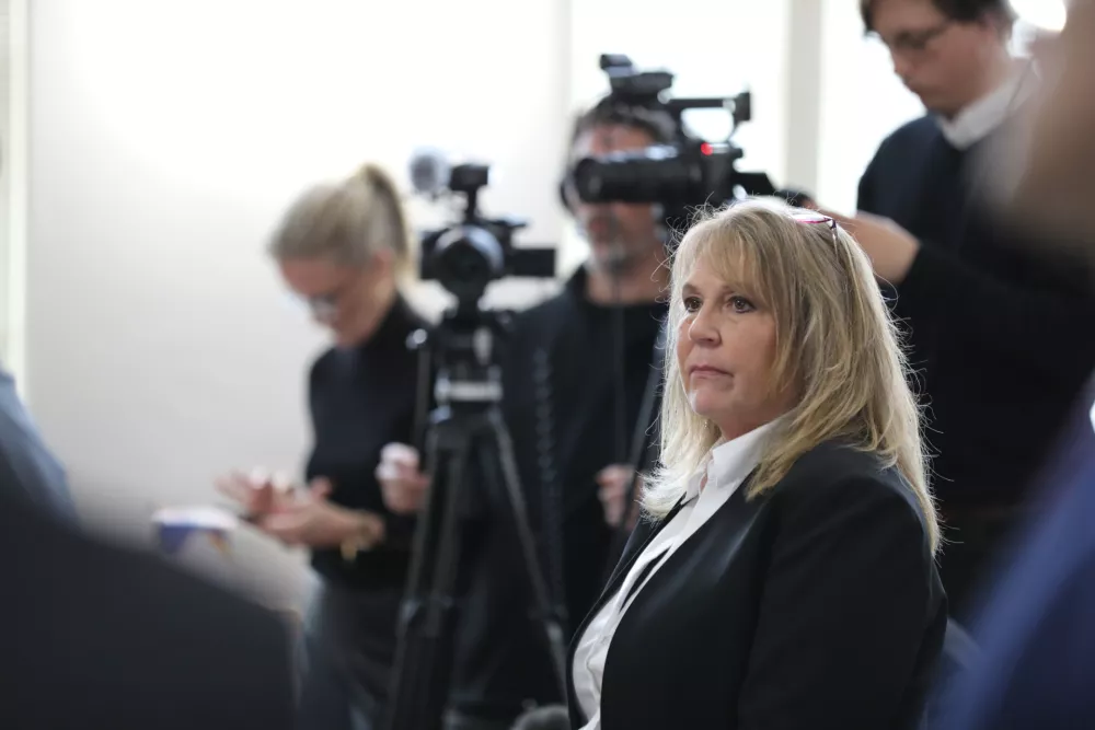 FILE - Former Colleton County Clerk of Court Mary Rebecca "Becky" Hill listens during her guilty plea, Dec. 8, 2025, in St. Matthews, S.C. (AP Photo/Jeffrey Collins, File)