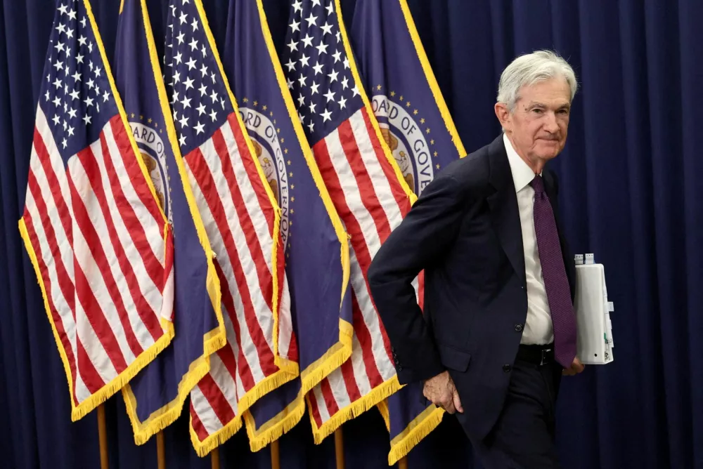 FILE PHOTO: U.S. Federal Reserve Chair Jerome Powell departs following his final press conference following a two-day meeting of the Federal Open Market Committee (FOMC), at the U.S. Federal Reserve in Washington, D.C., U.S., April 29, 2026. REUTERS/Kevin Lamarque/File Photo