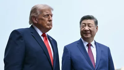 China's President Xi Jinping, right, and U.S. President Donald Trump visit the Temple of Heaven in Beijing Thursday, May 14, 2026. (Brendan Smialowski/Pool Photo via AP)