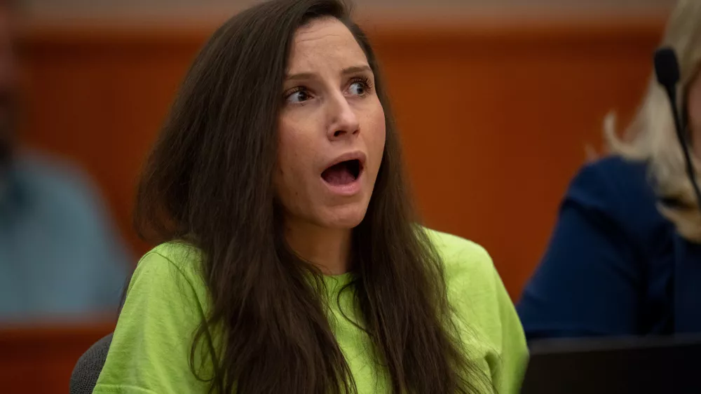 Kouri Richins reacts to impact statements from the Richins family during her sentencing in 3rd District Court in Park City, Utah, Wednesday, May 13, 2026. (Trent Nelson/The Salt Lake Tribune via AP, Pool)