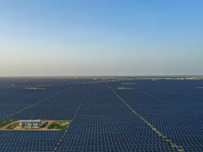This photo taken on October 6, 2021 shows solar panels at the site of solar energy projects developer Saurya Urja Company of Rajasthan Limited, at the Bhadla Solar Park in Bhadla, in the northern Indian state of Rajasthan. Currently, coal powers 70 percent of the nation's electricity generation, but Indian Prime Minister Narendra Modi pledged on November 1 that it would produce more energy than India's entire grid now through solar and other renewables by 2030.,Image: 640990689, License: Rights-managed, Restrictions: TO GO WITH Climate-UN-COP26-energy-solar,FEATURE by Glenda KWEK, Model Release: no 