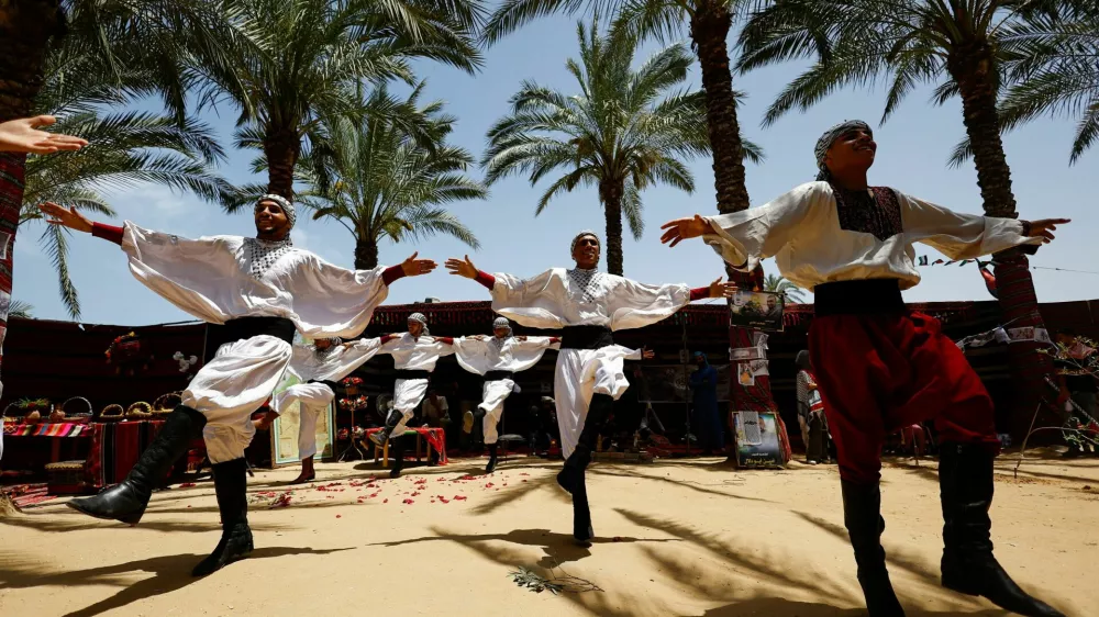 Palestinians attend an event to mark the 78th anniversary of the Nakba, in Zawayda, in the central Gaza Strip, May 14, 2026. REUTERS/Mahmoud Issa