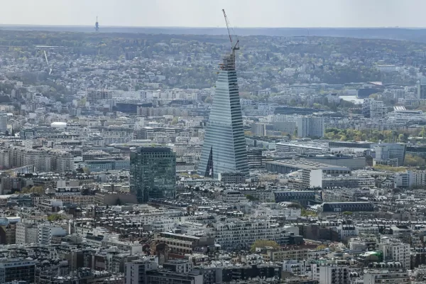 This photograph taken from the observation gallery on the top of the Tour Montparnasse (Montparnasse Tower) shows the Tour Triangle, designed by Swiss firm Herzog & de Meuron, under construction in Paris on March 30, 2026,Image: 1087703324, License: Rights-managed, Restrictions:, Model Release: no 