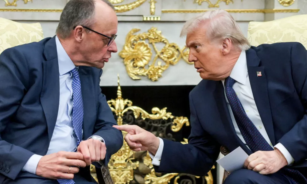 FILE PHOTO: U.S. President Donald Trump and German Chancellor Friedrich Merz meet in the Oval Office at the White House in Washington, D.C., U.S., March 3, 2026. REUTERS/Jonathan Ernst/File Photo