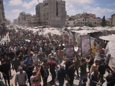 Palestinians attend the funeral of Izz al-Din al-Haddad, the leader of Hamas' Qassam Brigades, and his daughter and wife in Gaza City, Saturday, May 16, 2026. They were killed in an Israeli strike Friday evening. (AP Photo/Abdel Kareem Hana)