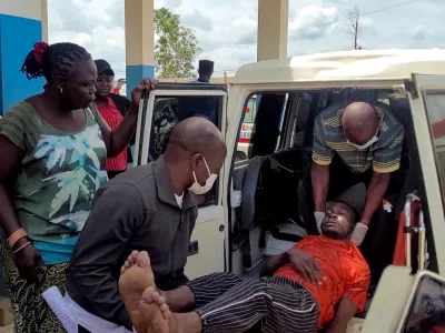 FILE PHOTO: A man is carried from an ambulance as he arrives at Bunia General Referral Hospital following confirmation of an Ebola outbreak involving the Bundibugyo strain in Bunia, Ituri province, Democratic Republic of Congo, May 16, 2026. REUTERS/Victoire Mukenge/File Photo