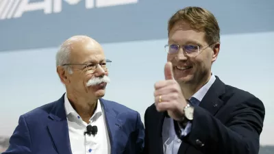 Ola Kallenius, right, member of the Board of Management of Daimler AG. Group Research & Mercedes-Benz Cars Development, gives a thumbs-up as Dieter Zetsche, Chairman of the Board of Management of Daimler AG, Head of Mercedes-Benz Cars, looks on during a media preview at the Auto show in Paris, France, Tuesday, Oct. 2, 2018, 2018. (AP Photo/Thibault Camus)