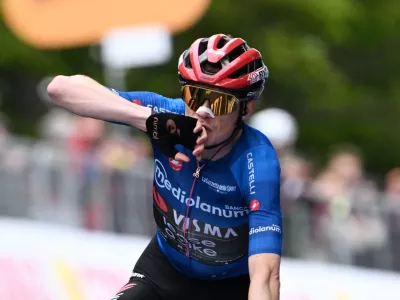 Cycling - Giro d'Italia - Stage 9 - Cervia to Corno alle Scale - Italy - May 17, 2026 Team Visma - Lease a Bike's Jonas Vingegaard celebrates after crossing the finish line to win stage 9 REUTERS/Jennifer Lorenzini