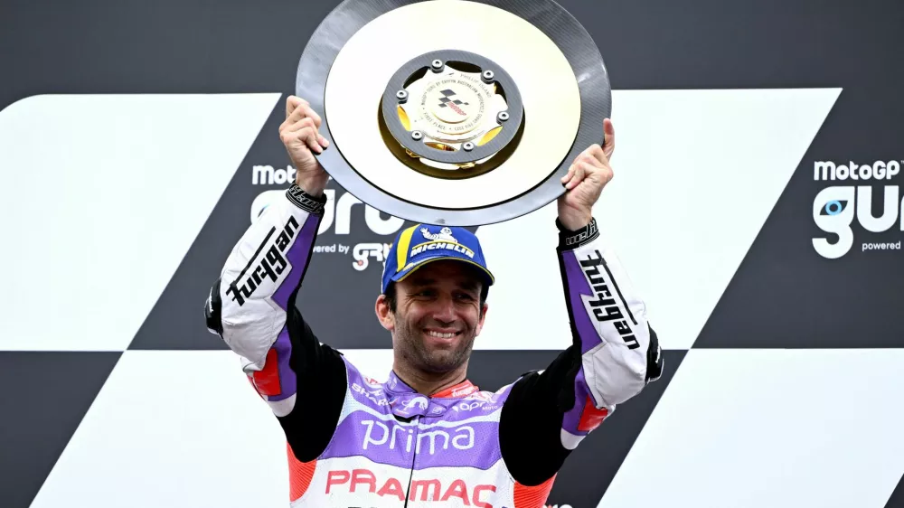 MotoGP - Australian Grand Prix - Phillip Island Grand Prix Circuit, Victoria, Australia - October 21, 2023 Prima Pramac Racing's Johann Zarco celebrates with the trophy on the podium after winning the race Joel Carrett/AAP Image via REUTERS   ATTENTION EDITORS - THIS IMAGE WAS PROVIDED BY A THIRD PARTY. NO RESALES. NO ARCHIVES. AUSTRALIA OUT. NEW ZEALAND OUT