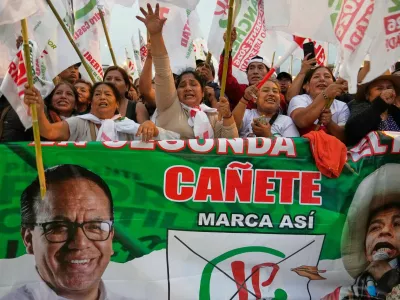 Supporters of presidential candidate Roberto Sanchez of Together for Peru party cheer during a rally in Lima, Peru, Sunday, May 17, 2026. (AP Photo/Martin Mejia)