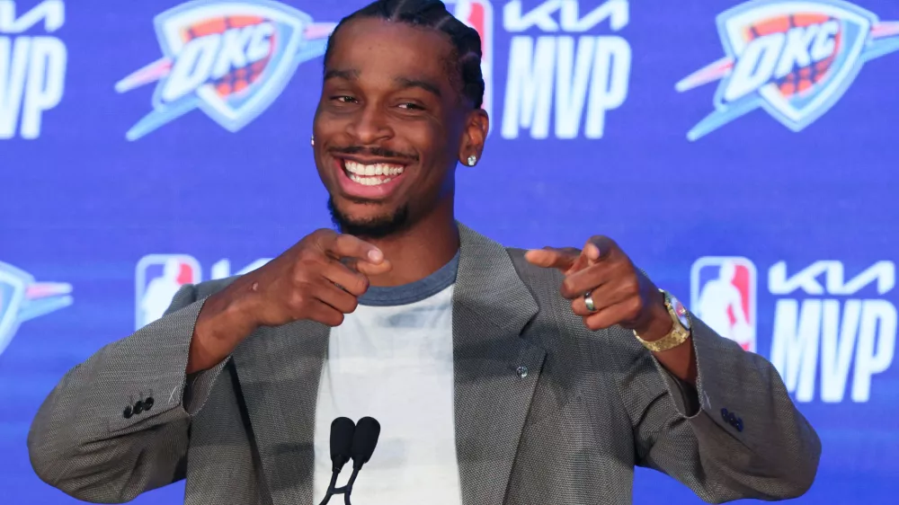 Oklahoma City Thunder guard Shai Gilgeous-Alexander gestures during a news conference after being named the NBA basketball MVP Sunday, May 17, 2026, in Oklahoma City. (AP Photo/Nate Billings)