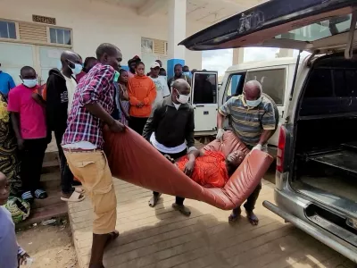 A man is carried from an ambulance as he arrives at Bunia General Referral Hospital following confirmation of an Ebola outbreak involving the Bundibugyo strain in Bunia, Ituri province, Democratic Republic of Congo, May 16, 2026. Picture taken with a mobile phone. REUTERS/Victoire Mukenge